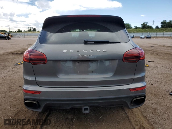 2016 Porsche Cayenne z VIN WP1AA2A21GKA10062, wystawiony jako Copart lot #64639685 z przebiegiem 52 962 mil mil oraz Szkoda całkowita • Salvage title. Historia ofert i sprzedaży dostępna na DreamBid. Obrazek 6.