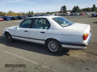 1993 BMW 7 Series with VIN WBAGD4323PDE63700, listed as a Copart auction lot 79675024 with 248,056 mi miles and Clean title. Bid and sale history available at DreamBid. Image 2.