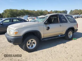 2000 Ford Explorer Sport with VIN 1FMYU60E3YUA95157, listed as a Copart auction lot 77214804 with 322,604 mi miles and Salvage title. Bid and sale history available at DreamBid. Image 1.