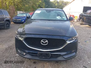 2017 Mazda CX-5 Touring with VIN JM3KFBCL6H0170455, listed as a IAAI auction lot 40381242 with 71,520 mi miles. Bid and sale history available at carsss.com. Image 12.
