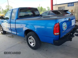 1999 Ford F-150 XL with VIN 1FTRX17L9XNB83680, listed as a IAAI auction lot 42636807 with Not provided miles and . Bid and sale history available at DreamBid. Image 3.