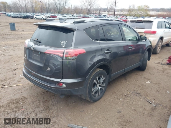 2017 Toyota RAV4 LE with VIN JTMBFREV3HJ704411, listed as a IAAI auction lot 40868831 with 102,729 mi miles. Bid and sale history available at carsss.com. Image 4.
