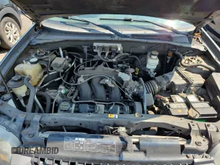 2005 Ford Escape XLT with VIN 1FMYU93135DA09027, listed as a Copart auction lot 63322395 with 144,020 mi miles and Clean title. Bid and sale history available at DreamBid. Image 12.