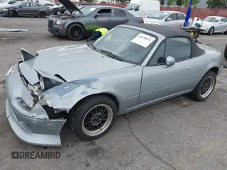 1992 Mazda MX-5 Miata z VIN JM1NA3514N0314487, wystawiony jako IAAI lot #42036631 z przebiegiem 125 882 mil mil oraz . Historia ofert i sprzedaży dostępna na DreamBid. Obrazek 2.