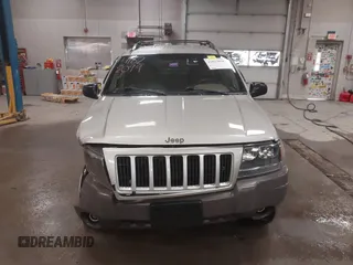 2004 Jeep Grand Cherokee Laredo with VIN 1J4GW48S44C321869, listed as a IAAI auction lot 41822099 with 181,663 mi miles. Bid and sale history available at carsss.com. Image 12.