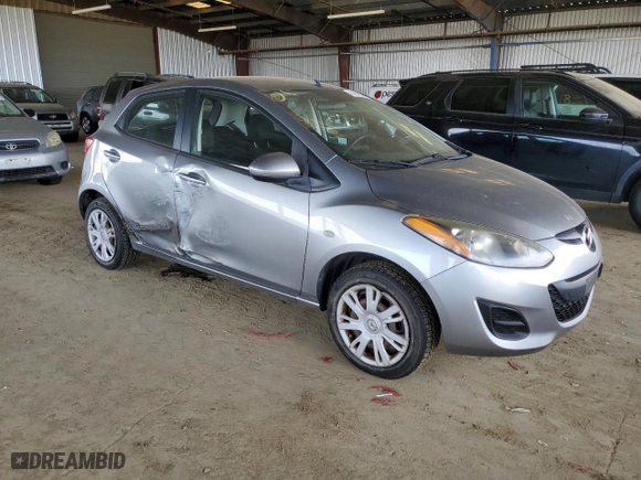 2013 Mazda Mazda2 Sport with VIN JM1DE1KZ5D0153225, listed as a Copart auction lot 50942555 with 105,958 mi miles and Salvage Title. Bid and sale history available at carsss.com. Image 4.