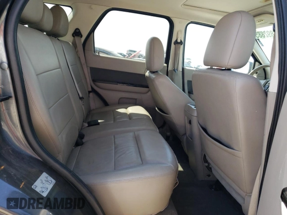 2010 Ford Escape Hybrid z VIN 1FMCU4K32AKB79563, wystawiony jako Copart lot #52892885 z przebiegiem 177 008 mil mil oraz Szkoda całkowita • Salvage title. Historia ofert i sprzedaży dostępna na DreamBid. Obrazek 10.