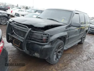 2000 Cadillac Escalade z VIN 1GYEK63R8YR188250, wystawiony jako IAAI lot #41412615 z przebiegiem 190 542 mil mil oraz . Historia ofert i sprzedaży dostępna na DreamBid. Obrazek 2.