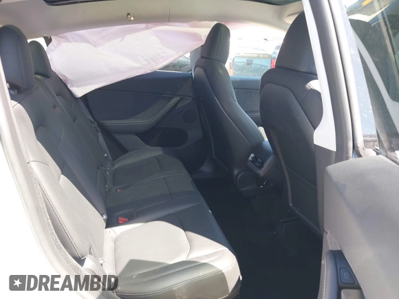 2024 Tesla Model Y with VIN 7SAYGDED0RA327806, listed as a IAAI auction lot 42096752 with 13,244 mi miles and . Bid and sale history available at DreamBid. Image 8.