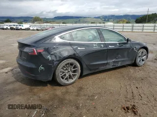 2019 Tesla Model 3 Long Range with VIN 5YJ3E1EB8KF384533, listed as a Copart auction lot 48557255 with 73,768 mi miles and Salvage Title. Bid and sale history available at carsss.com. Image 3.