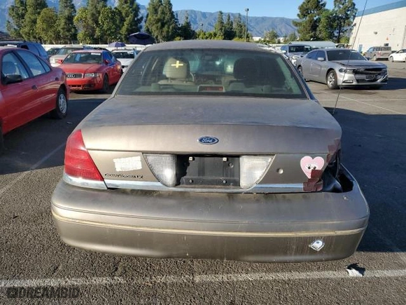 2005 Ford Crown Victoria LX with VIN 2FAFP74W75X129929, listed as a Copart auction lot 89020125 with 156,115 mi miles and Salvage Title. Bid and sale history available at carsss.com. Image 6.