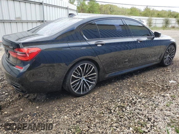 2019 BMW 7 Series 740i with VIN WBA7E2C57KB217455, listed as a Copart auction lot 69580773 with 74,717 mi miles and . Bid and sale history available at DreamBid. Image 3.
