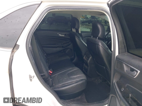 2015 Ford Edge Titanium z VIN 2FMTK3K82FBC42299, wystawiony jako IAAI lot #41912657 z przebiegiem 198 144 mil mil oraz . Historia ofert i sprzedaży dostępna na DreamBid. Obrazek 8.
