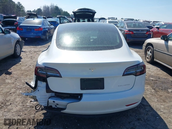 2023 Tesla Model 3 Long Range with VIN 5YJ3E1EB1PF393565, listed as a IAAI auction lot 41656060 with 16,236 mi miles and . Bid and sale history available at DreamBid. Image 16.
