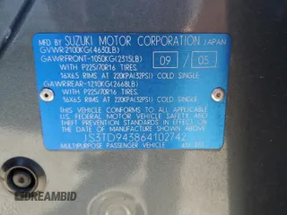 2006 Suzuki Grand Vitara Premium z VIN JS3TD943864102742, wystawiony jako Copart lot #70721944 z przebiegiem 117 402 mil mil oraz Szkoda całkowita • Salvage title. Historia ofert i sprzedaży dostępna na DreamBid. Obrazek 13.