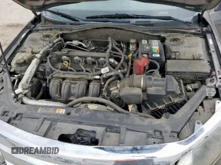 2012 Ford Fusion SE z VIN 3FAHP0HA9CR226737, wystawiony jako Copart lot #57229835 z przebiegiem 204 811 mil mil oraz Szkoda całkowita • Salvage title. Historia ofert i sprzedaży dostępna na DreamBid. Obrazek 11.