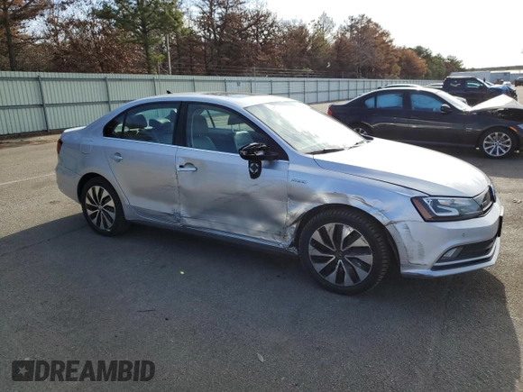 2015 Volkswagen Jetta Sedan Hybrid SEL Premium with VIN 3VW637AJ7FM310554, listed as a Copart auction lot 79337953 with 115,248 mi miles. Bid and sale history available at carsss.com. Image 4.