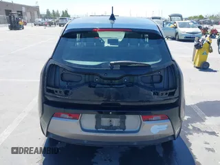 2014 BMW i3 with VIN WBY1Z4C56EV276183, listed as a IAAI auction lot 42345866 with 102,934 mi miles and . Bid and sale history available at DreamBid. Image 6.