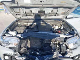2018 Toyota Tacoma SR5 with VIN 3TMDZ5BN3JM054548, listed as a IAAI auction lot 42038480 with 122,242 mi miles and . Bid and sale history available at DreamBid. Image 10.