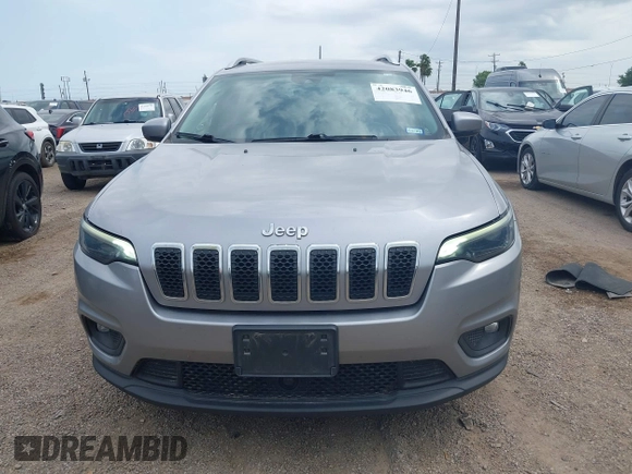 2021 Jeep Cherokee Altitude with VIN 1C4PJLLB2MD164004, listed as a IAAI auction lot 42083946 with 99,136 mi miles and . Bid and sale history available at DreamBid. Image 12.