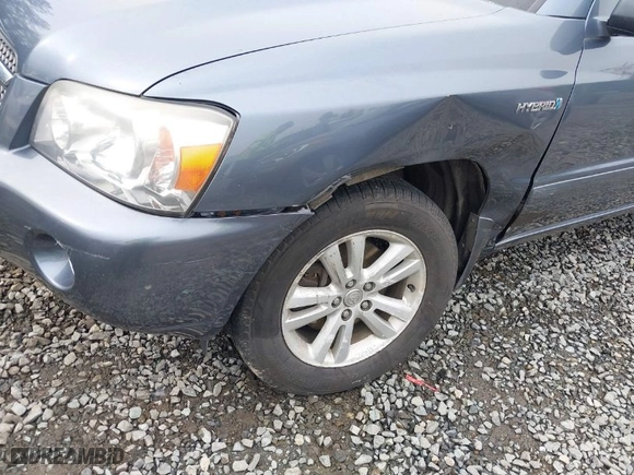 2006 Toyota Highlander Hybrid with VIN JTEEW21A260023243, listed as a IAAI auction lot 41778209 with 230,228 mi miles. Bid and sale history available at carsss.com. Image 6.