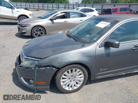 2010 Ford Fusion Hybrid with VIN 3FADP0L37AR270739, listed as a IAAI auction lot 42143035 with 238,111 mi miles. Bid and sale history available at carsss.com. Image 12.