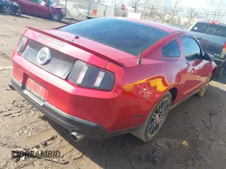 2010 Ford Mustang GT with VIN 1ZVBP8CH9A5121129, listed as a IAAI auction lot 41688528 with 113,089 mi miles. Bid and sale history available at carsss.com. Image 4.