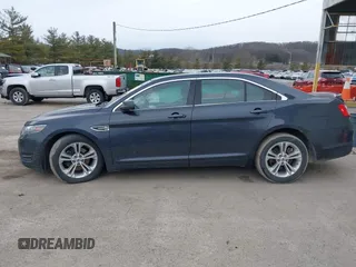 2017 Ford Taurus SEL with VIN 1FAHP2E80HG136825, listed as a IAAI auction lot 41642935 with 144,749 mi miles and . Bid and sale history available at DreamBid. Image 14.