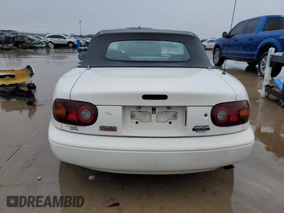 1994 Mazda MX-5 Miata with VIN JM1NA353XR0502129, listed as a Copart auction lot 42827275 with Not provided miles and Salvage title. Bid and sale history available at DreamBid. Image 6.