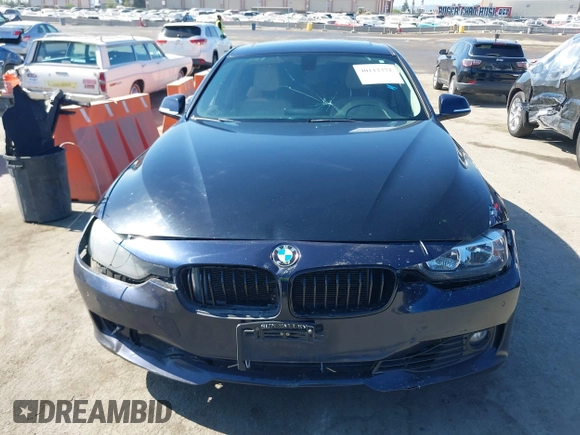 2015 BMW 3 Series 328i with VIN WBA3C1C50FK124300, listed as a IAAI auction lot 40112372 with 142,591 mi miles and . Bid and sale history available at carsss.com. Image 12.