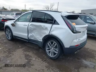 2020 Cadillac XT4 FWD Sport with VIN 1GYFZER45LF148806, listed as a IAAI auction lot 41853795 with 28,956 mi miles and . Bid and sale history available at carsss.com. Image 3.