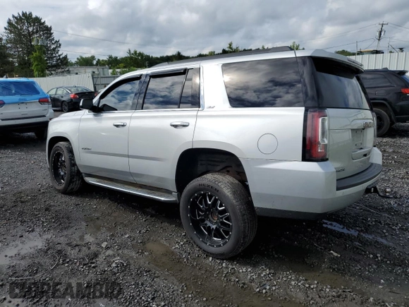 2015 GMC Yukon SLT with VIN 1GKS2BKC9FR518381, listed as a Copart auction lot 66352864 with 103,419 mi miles and Salvage Title. Bid and sale history available at DreamBid. Image 2.