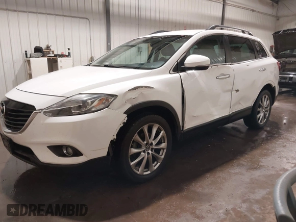 2014 Mazda CX-9 Grand Touring with VIN JM3TB3DA7E0428187, listed as a IAAI auction lot 41247569 with 117,590 mi miles and . Bid and sale history available at DreamBid. Image 18.