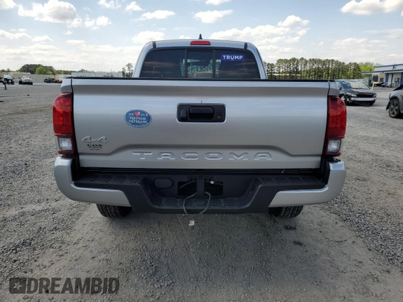 2023 Toyota Tacoma SR with VIN 3TYSX5ENXPT018099, listed as a Copart auction lot 52520145 with 15,640 mi miles and Salvage title. Bid and sale history available at DreamBid. Image 6.
