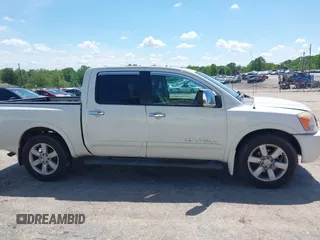2010 Nissan Titan SE with VIN 1N6BA0ED4AN323907, listed as a IAAI auction lot 42113512 with 198,530 mi miles. Bid and sale history available at carsss.com. Image 14.
