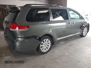 2013 Toyota Sienna XLE with VIN 5TDDK3DC9DS061903, listed as a IAAI auction lot 42067873 with 166,341 mi miles and . Bid and sale history available at DreamBid. Image 4.