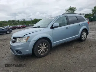 2013 Dodge Journey SXT with VIN 3C4PDCBG0DT619382, listed as a Copart auction lot 56565205 with 176,112 mi miles and Salvage title. Bid and sale history available at DreamBid. Image 1.
