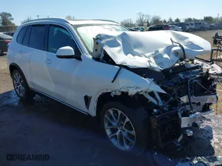 2024 BMW X5 xDrive40i with VIN 5UX23EU03R9V85249, listed as a IAAI auction lot 41876089 with 1 mi miles. Bid and sale history available at carsss.com. Image 1.