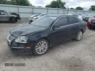 2009 Volkswagen Jetta SE with VIN 3VWRM71K49M172348, listed as a Copart auction lot 60603895 with 129,515 mi miles and Salvage title. Bid and sale history available at DreamBid. Image 1.