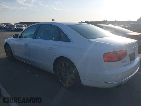 2013 Audi A8 3.0L z VIN WAURGAFD5DN009804, wystawiony jako IAAI lot #42642523 z przebiegiem 141 252 mil mil oraz . Historia ofert i sprzedaży dostępna na DreamBid. Obrazek 14.