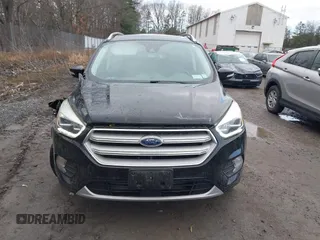 2018 Ford Escape Titanium с VIN 1FMCU9J99JUA14598, выставлен на аукционе IAAI как лот 41859368 с пробегом 59 438 миль миль и . История ставок и продаж доступна на DreamBid. Изображение 12.