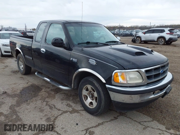 1997 Ford F-150 with VIN 2FTDX1720VCA73590, listed as a IAAI auction lot 41956713 with 128,220 mi miles and . Bid and sale history available at DreamBid. Image 1.