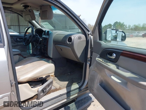 2002 GMC Envoy SLT with VIN 1GKDS13S422446808, listed as a IAAI auction lot 41896943 with 271,771 mi miles. Bid and sale history available at carsss.com. Image 5.
