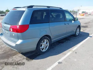 2006 Toyota Sienna XLE with VIN 5TDZA22C16S527865, listed as a IAAI auction lot 42028928 with 210,116 mi miles. Bid and sale history available at carsss.com. Image 4.