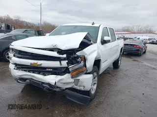 2018 Chevrolet Silverado 1500 LT with VIN 3GCUKREC3JG453433, listed as a IAAI auction lot 38138441 with 53,496 mi miles. Bid and sale history available at carsss.com. Image 2.