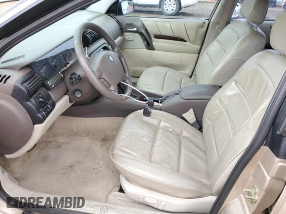 1998 Cadillac Catera z VIN W06VR52R5WR028774, wystawiony jako Copart lot #78085484 z przebiegiem 104 609 mil mil oraz Szkoda całkowita • Salvage title. Historia ofert i sprzedaży dostępna na DreamBid. Obrazek 7.