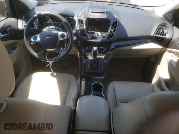 2015 Ford Escape Titanium z VIN 1FMCU0J93FUA66179, wystawiony jako Copart lot #61956325 z przebiegiem 82 889 mil mil oraz Szkoda całkowita • Salvage title. Historia ofert i sprzedaży dostępna na DreamBid. Obrazek 8.