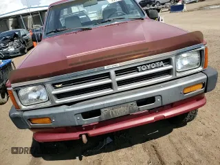 1988 Toyota Pickup с VIN JT4RN63A7J5038197, выставлен на аукционе Copart как лот 59910655 с пробегом 76 519 миль миль и Чистый • Clean title. История ставок и продаж доступна на DreamBid. Изображение 13.
