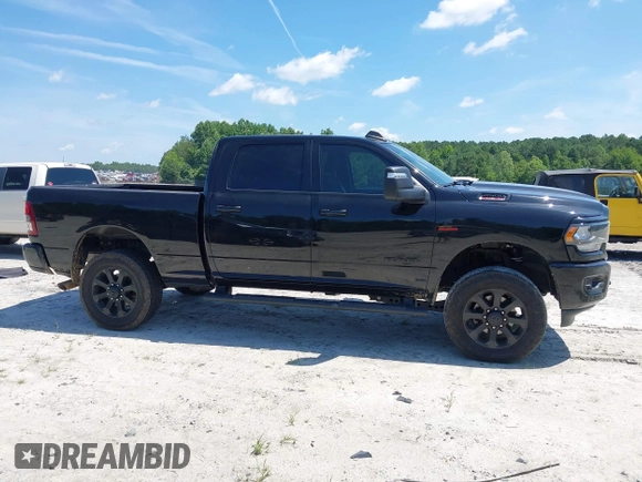 2023 Ram 2500 Big Horn with VIN 3C6UR5DL6PG504090, listed as a IAAI auction lot 42512380 with 50,231 mi miles and . Bid and sale history available at DreamBid. Image 14.