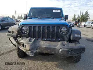 2022 Jeep Wrangler Unlimited Willys with VIN 1C4HJXDM0NW152614, listed as a Copart auction lot 83208664 with 51,913 mi miles and Salvage Title. Bid and sale history available at DreamBid. Image 5.